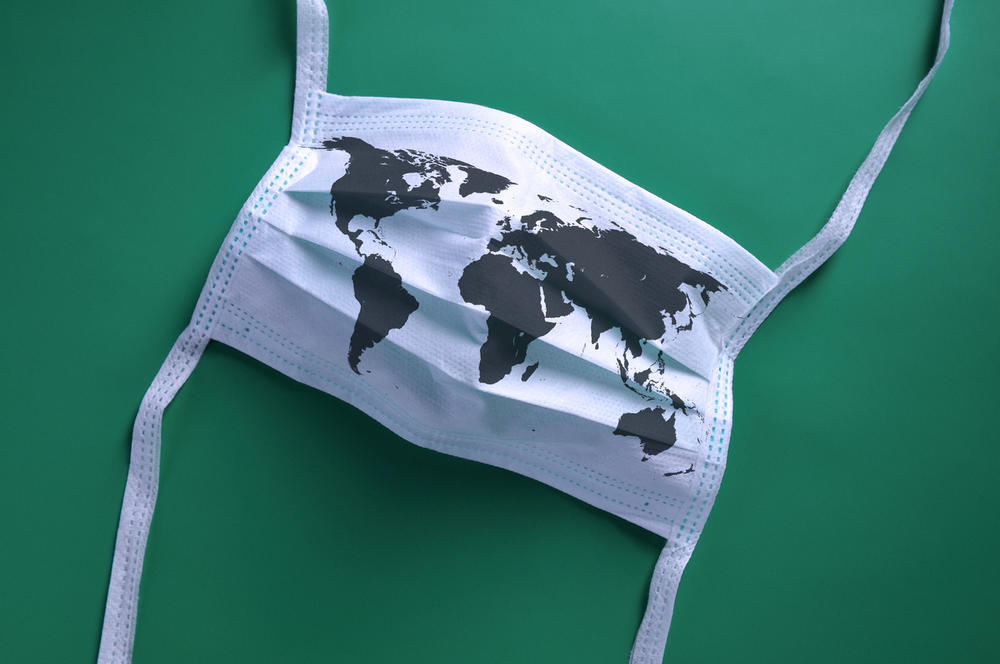 Medical mask with a print of the world map