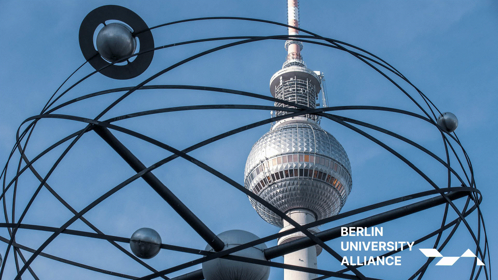 TV Tower through World Clock at Alexanderplatz