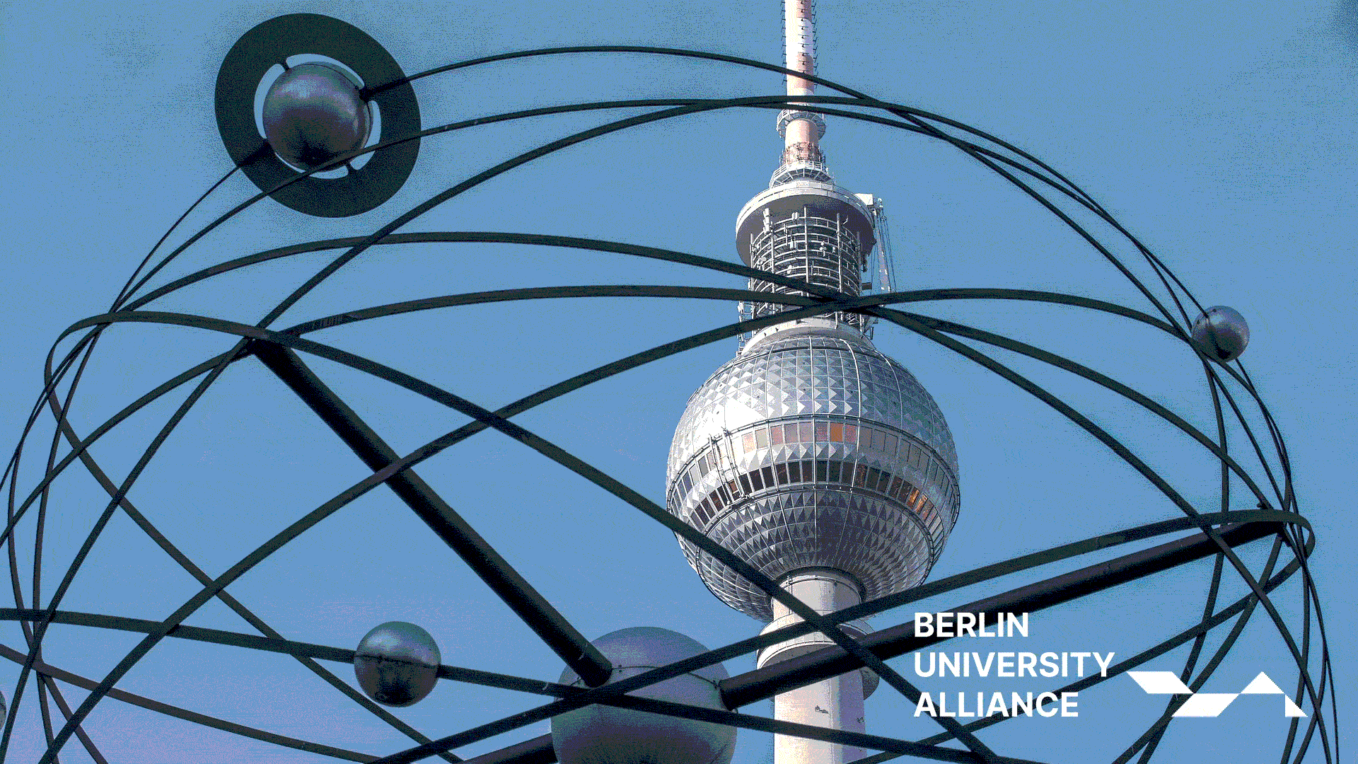 TV Tower through World Clock at Alexanderplatz