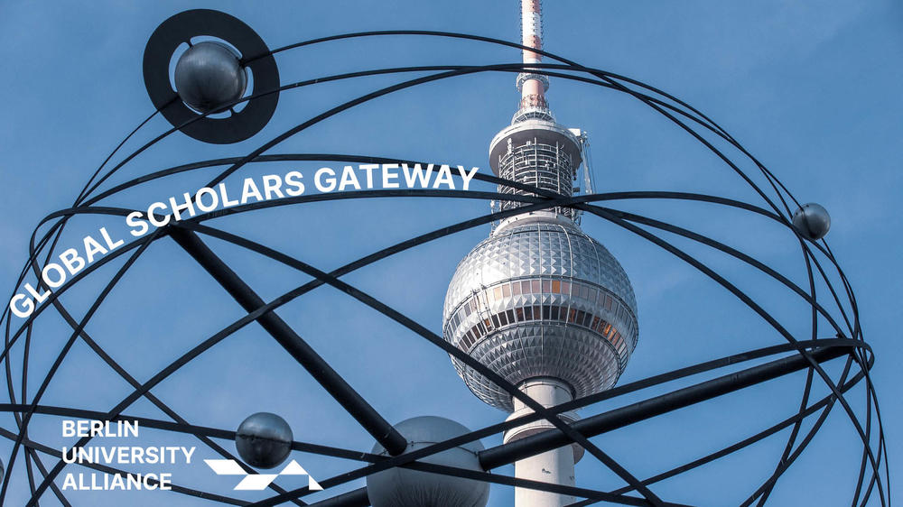 TV Tower through World Clock at Alexanderplatz