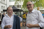 Albert Geukes, director of the Center for Digital Systems (CeDiS), standing with history professor Oliver Janz; both work at Freie Universität.