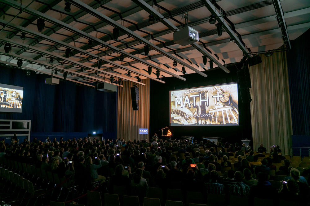 Painting with sand: Artist Natalia Moro opened the ceremony with shifting silhouettes cast by sand.  